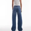 Jeans a vita bassa e gamba larga Topshop