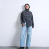 Jeans Tscinch a vita bassa e gamba larga