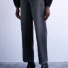 Jeans Tscinch a vita bassa e gamba larga