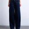 Jeans Tscinch a vita bassa e gamba larga