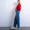Jeans Tscinch a vita bassa e gamba larga