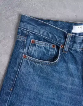 Jeans Tscinch a vita bassa e gamba larga