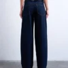 Jeans Tscinch a vita bassa e gamba larga