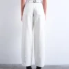 Jeans Tscinch a vita bassa e gamba larga