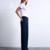Jeans Tscinch a vita bassa e gamba larga
