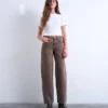 Jeans Tscinch a vita bassa e gamba larga