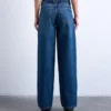 Jeans Tscinch a vita bassa e gamba larga