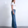 Jeans Tsember a vita bassa e gamba larga