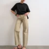 Jeans Tsember a vita bassa e gamba larga