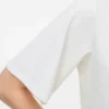 Top dal taglio regolare con scollo rotondo